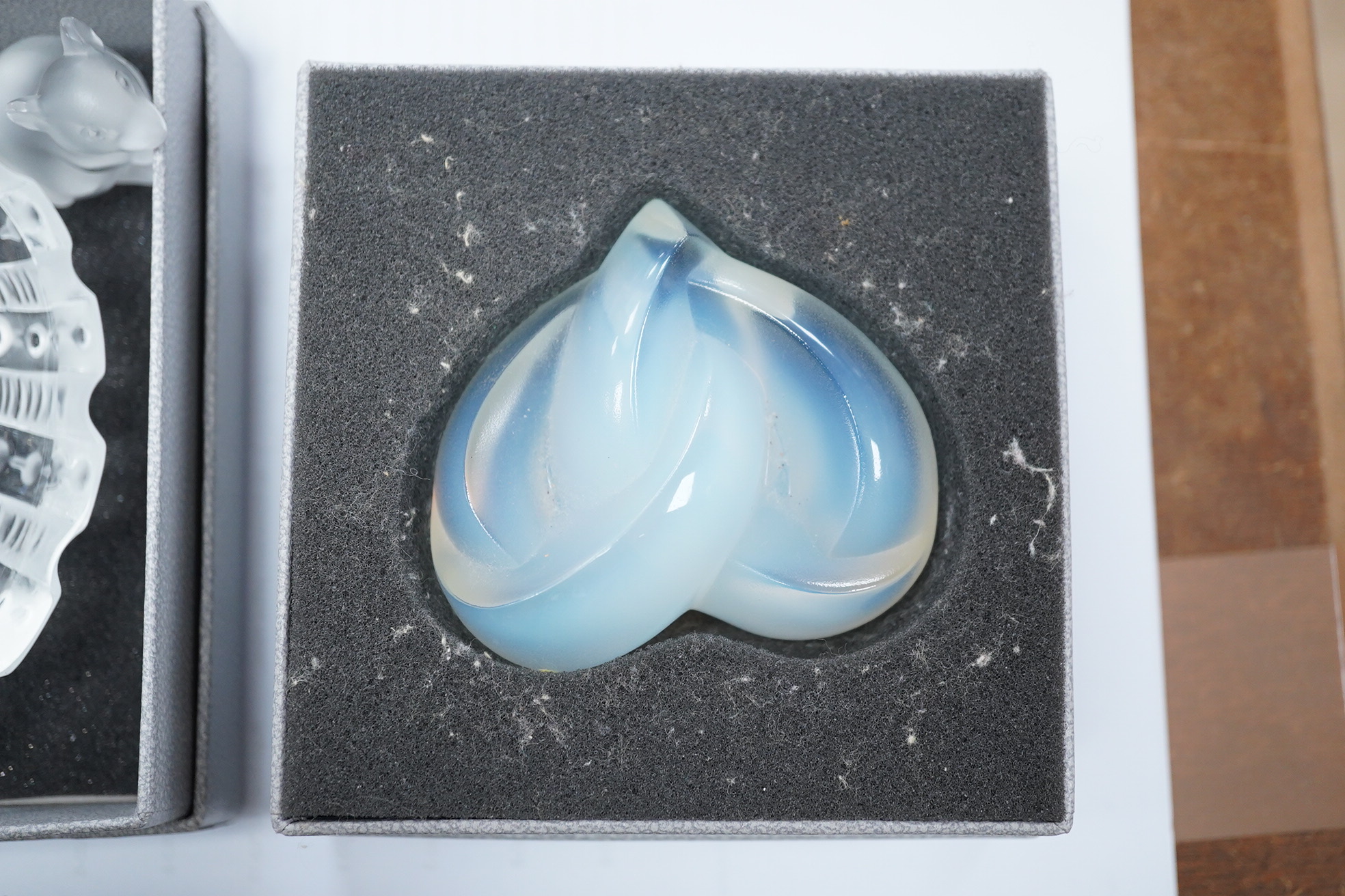 Three items of modern Lalique glass comprising paperweight in the form of a heart, shell dish and mouse, two boxed, largest 12.5cm. Condition - good